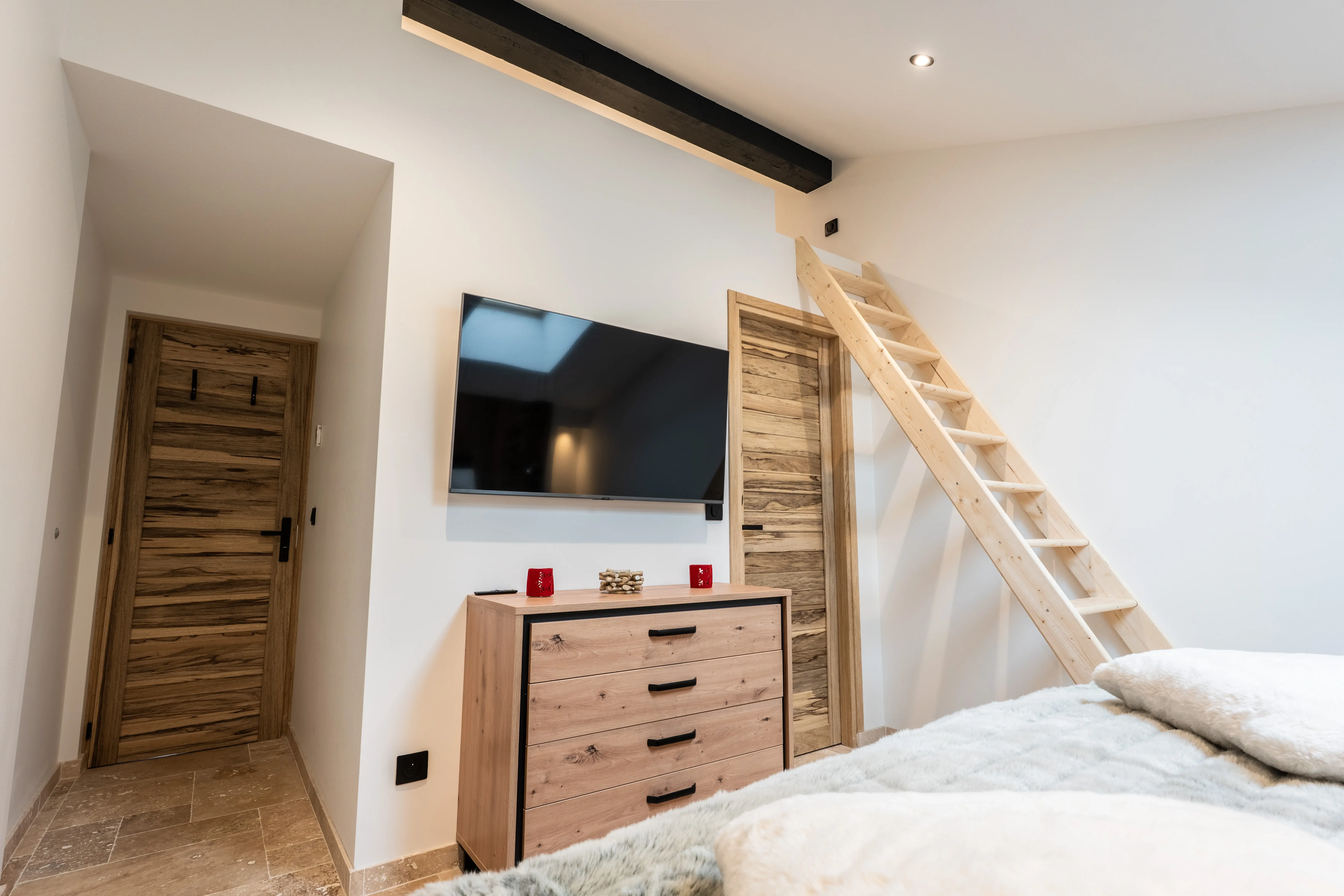 Suites avec TV intégrées et ambiance chaleureuse